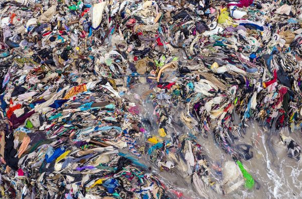 Heaps of unwanted clothes from the UK wash up on Ghana's beaches